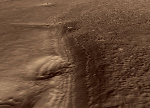This perspective view generated from digital topography provides an overview of the Mars terrain covered in the first color image of Mars from the High Resolution Imaging Science Experiment (HiRISE) camera on NASA's Mars Reconnaissance Orbiter.