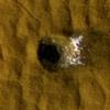 Twelve-Meter-Wide Crater Excavates Ice on Mars