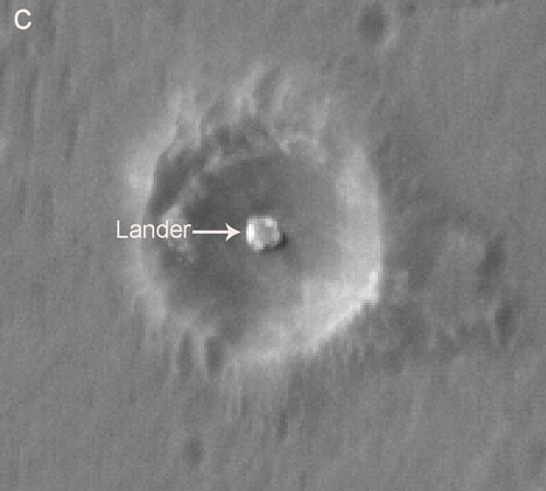 This image shows 'Eagle crater', the small martian impact crater where Opportunity's airbag-cushioned lander came to rest.
