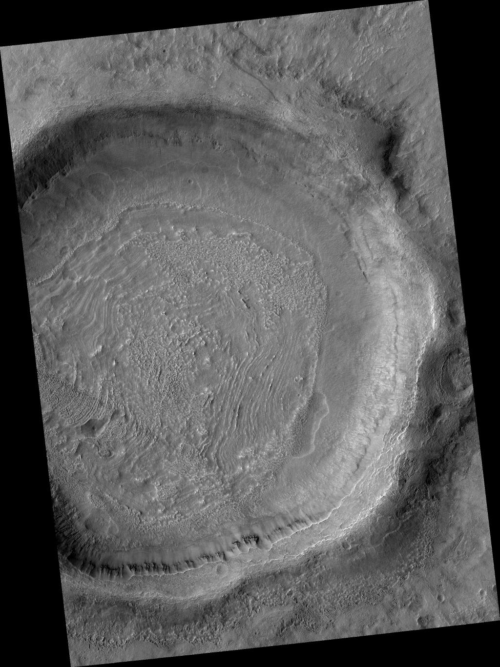 Crater in Thaumasia Fossae