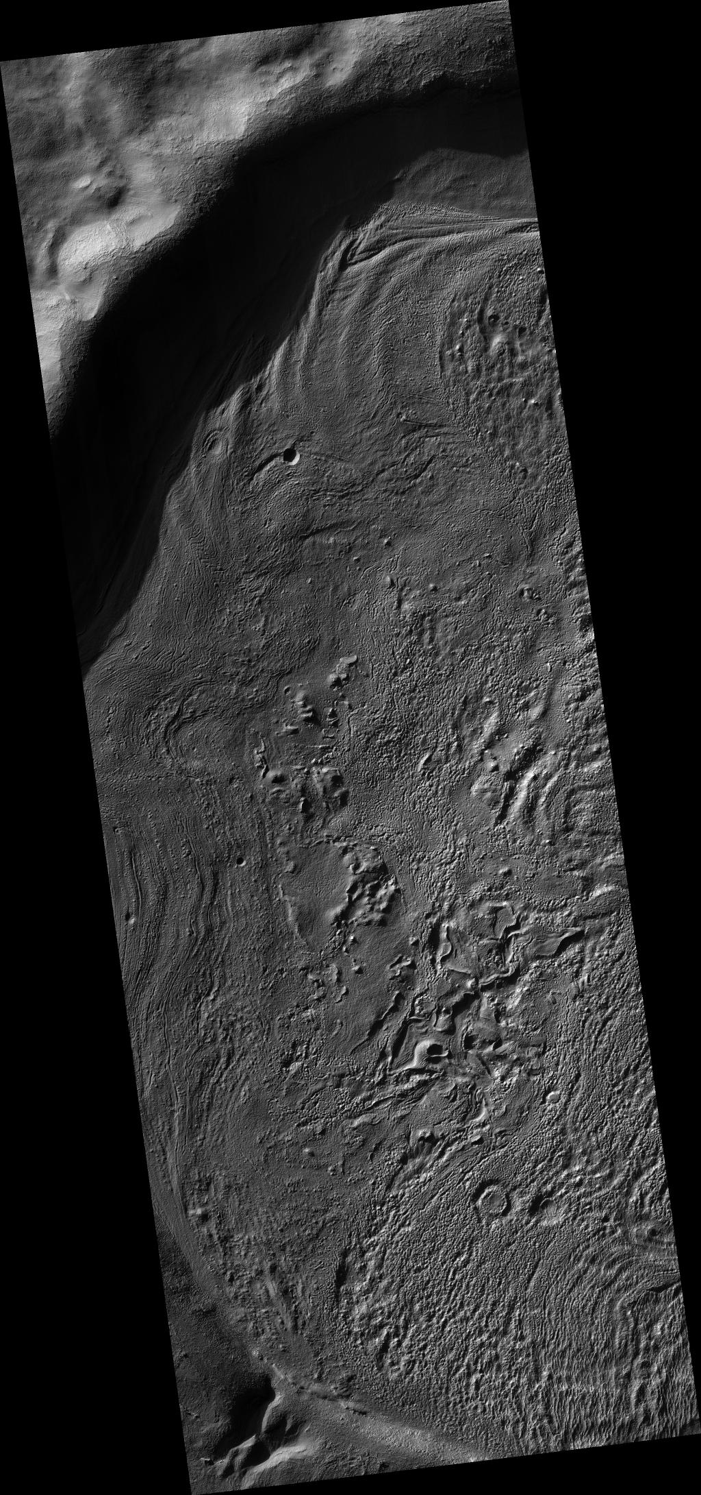 Crater Floor Deposits in Promethei Terra