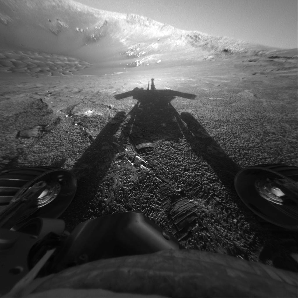 This self-portrait of NASA's Mars Exploration Rover Opportunity comes courtesy of the Sun and the rover's front hazard-avoidance camera.