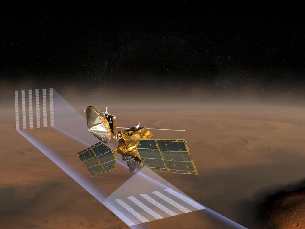 This artist's concept of NASA's Mars Reconnaissance Orbiter at Mars features one of its instruments -- the Mars Climate Sounder -- in action.