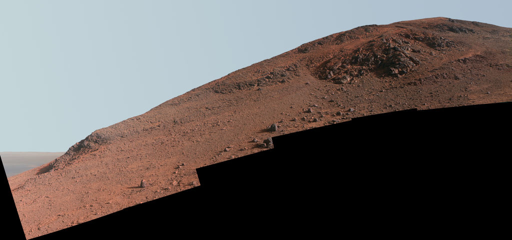 This scene from NASA's Mars Exploration Rover Opportunity looks upward at "Knudsen Ridge" on the southern edge of "Marathon Valley" from inside the valley.