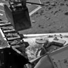 Read the article 'NASA's Phoenix Mars Lander Delivers Soil Sample to Microscope'
